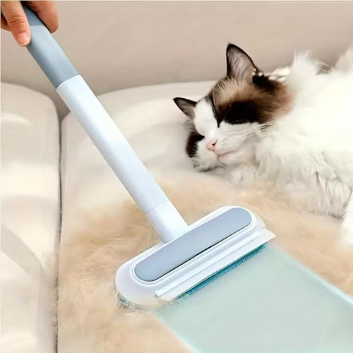 Reusable Pet Hair Remover Tool being used on a sofa near a sleeping cat.